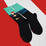Black socks with a Santa-themed Mona Lisa design on a red and white background thumbnail