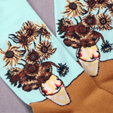 Socks with sunflower and bear design on a light blue background