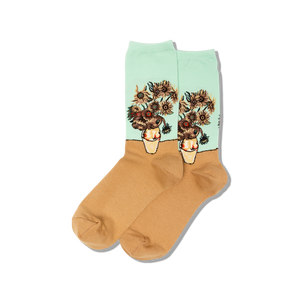 Pair of socks with sunflower design on a light green background