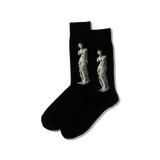 Black socks with white statue design on a white background