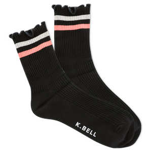 Black socks with pink and white stripes on a white background, featuring the brand 'K. Bell'.