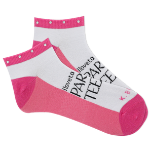 A pair of women's low-cut socks with pink and white colors, featuring text that reads 'I love to par-tee' and the K.Bell logo.