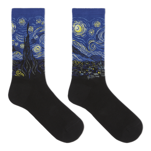 A pair of crew socks with a black lower half and a blue cuff printed with a Van Gogh-inspired swirling night sky design in yellow, white, and black.