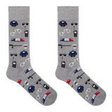 A pair of heather gray crew socks featuring a repeating pattern of police-themed items including blue police hats, walkie-talkies, handcuffs, batons, and red-and-blue light bars, shown on a plain white background.