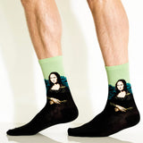 Mona Lisa-themed socks worn by a person on a plain background thumbnail