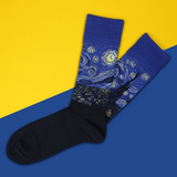 Pair of socks with 'Starry Night' design on a yellow and blue background