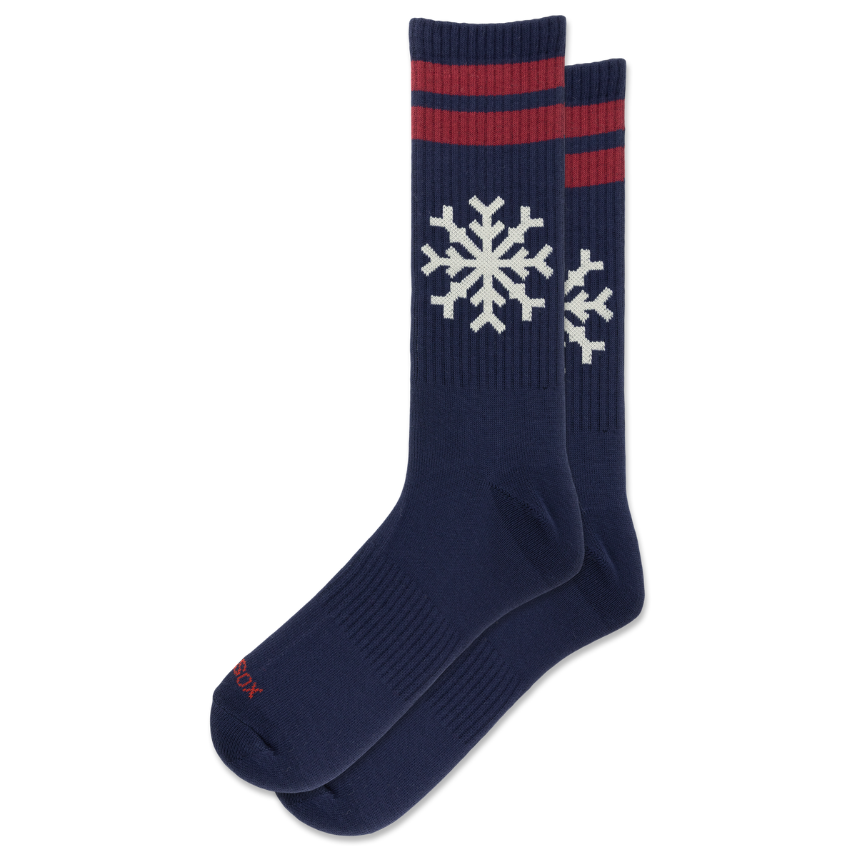 A pair of navy blue crew socks with red stripes near the top and white snowflake motifs, displayed on a clean white background.