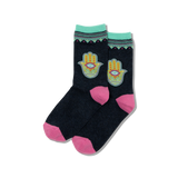 A pair of women's crew socks with a hamsa hand design in multicolor on a black background.