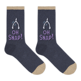 A pair of dark heather navy crew socks with beige toes and heels, featuring a white wishbone graphic and the text 'OH SNAP!' in lavender on the side, shown against a plain white background.