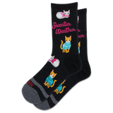 A pair of black crew socks with a cozy pattern of orange and white kittens wearing blue and pink sweaters, alongside the pink text 'Sweater Weather'. The toes and heels are gray, and the word 'SOX' is printed on the toe.