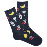 A pair of navy blue crew socks with various colorful patterns including a banana, cherries, a mug with whipped cream, a lemon, and other novelty items.
