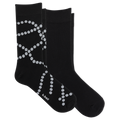 Two black crew socks with a white dotted pearl pattern, displayed on a clean white background. The brand name 'k-bell' is printed in white near the toe of the front sock.