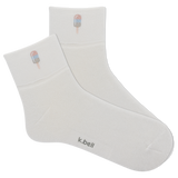 White socks with ice cream cone design and 'k.bell' branding on a white background