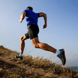 Person running on a trail with a clear blue sky thumbnail