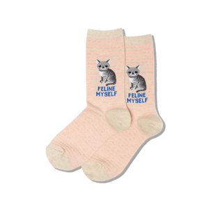 Pink socks with cat illustrations and 'Feline Myself' text on a white background