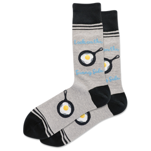 Gray socks with egg and pan design on a white background
