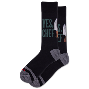 Black socks with text and knife graphics on a white background