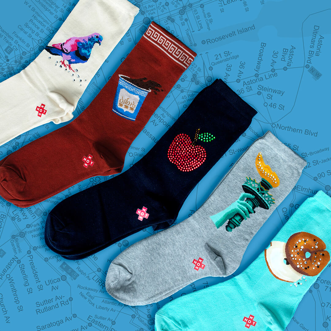 Assorted women's New York-themed novelty crew HOTSOX with rhinestones and decorative motifs.