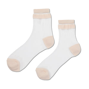 Pair of white socks with beige accents on a white background