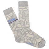 Gray socks with a pattern and 'K. Bell' branding on a white background