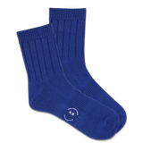 Pair of blue socks with a K.Bell logo on a white background