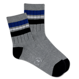 A pair of men's short crew socks with a striped pattern in gray, black, and blue colors. thumbnail