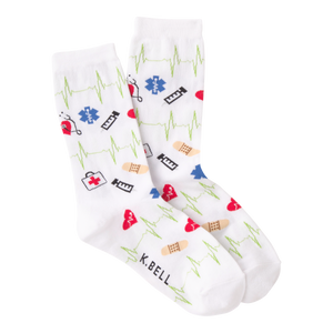 White socks with medical-themed designs and 'K. Bell' branding on a white background