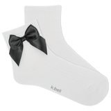 White sock with a black bow on a white background, featuring the brand 'k.bell'. thumbnail