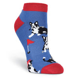 Blue sock with black and white dog design and red accents on a white background