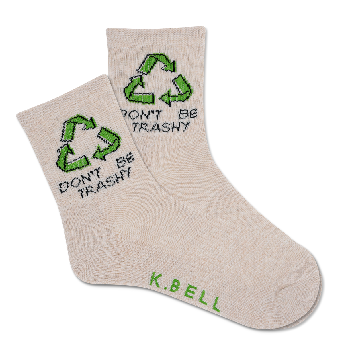 A pair of white crew socks with green recycling symbols and the text 'DON'T BE TRASHY' printed on the side, signed by 'K.BELL'.
