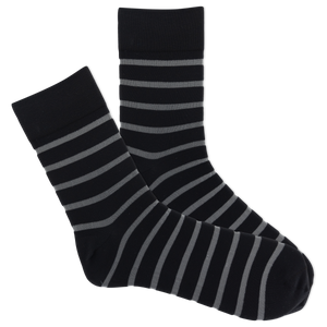 Sheer striped black socks on a white background