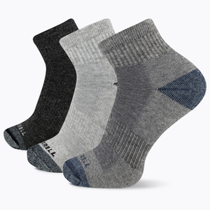 Three pairs of socks in black, gray, and a mix of gray and blue on a white background.