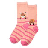 Person wearing pink and beige striped socks with fox designs on a gray floor. thumbnail
