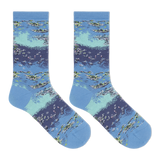 A pair of women's crew socks with a Monet's water lilies print in blue, green, and white colors.