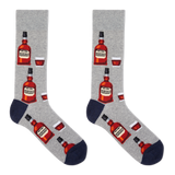 A pair of men's crew socks with a bourbon design, featuring illustrations of bourbon bottles and a glass on a gray background. thumbnail